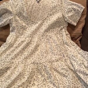 White with black dotted animal print accents